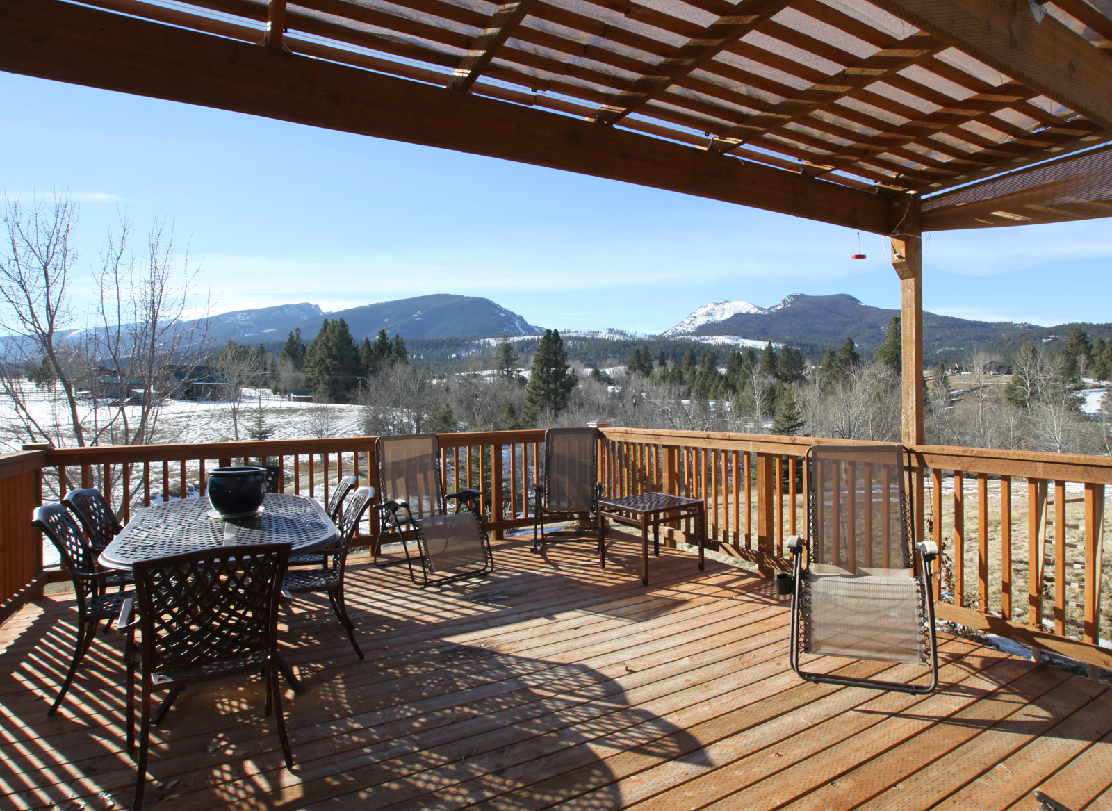 Gazing on majestic mountain views from the deck