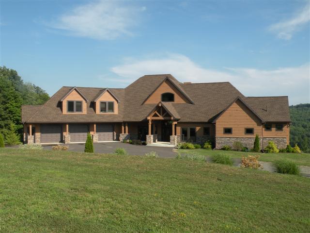 Contemporary log and stone home